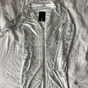 New with tags fashion nova mini dress with a metallic snake print. Size M.